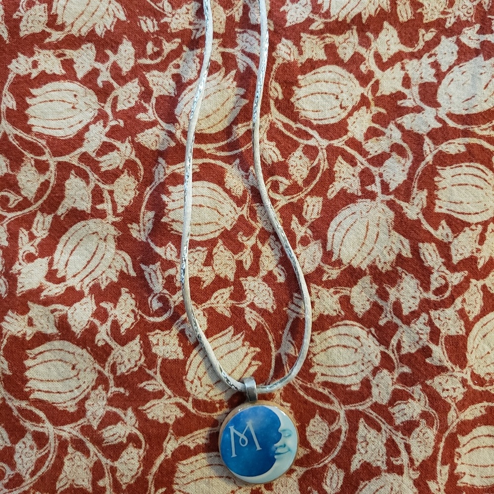 Necklace with M & moon pendant